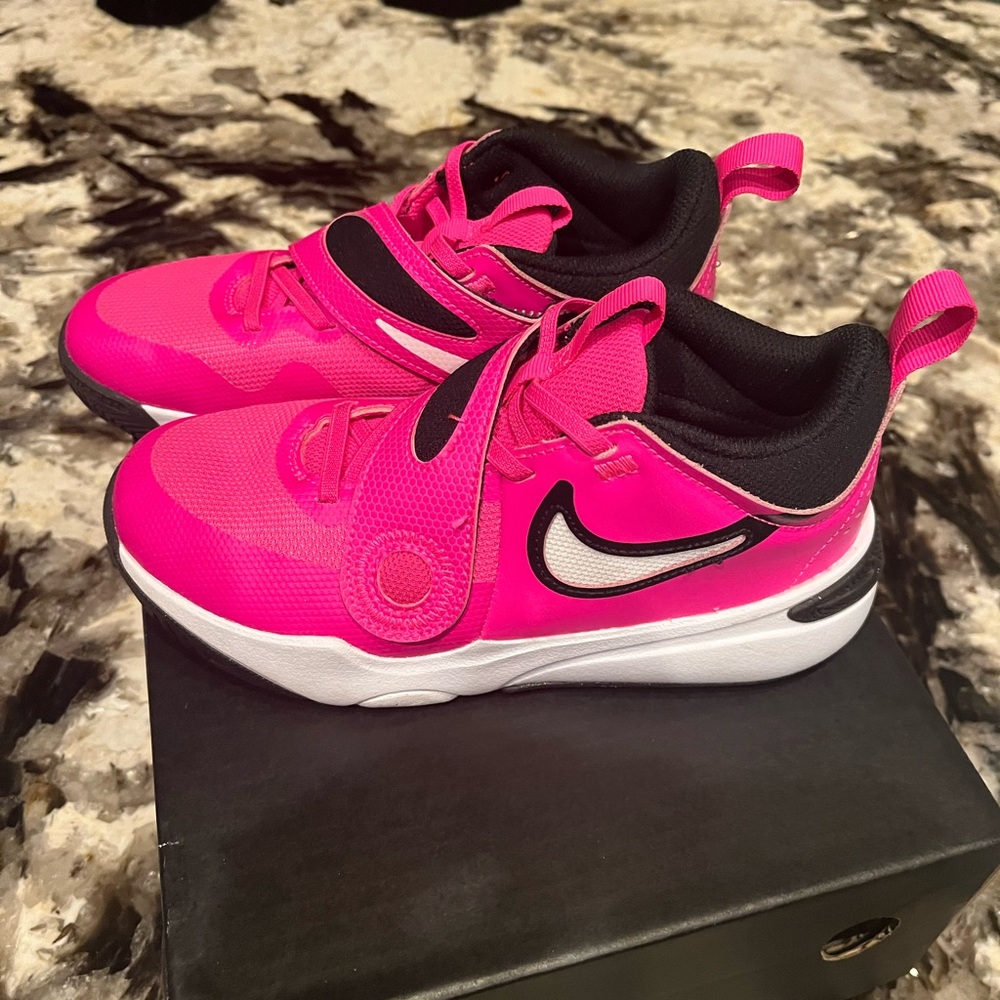 Nike basketball shoes girls size 2.5. Great condition.